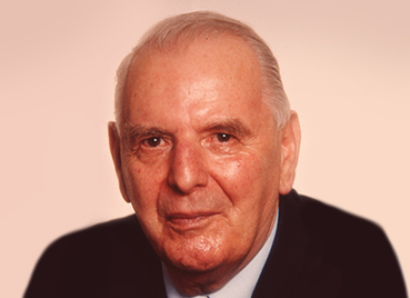 Portrait von Karl Streck, Firmengründer von Streck Transport, als älterem Mann